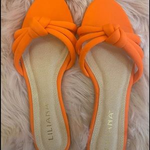 Neon orange sandals